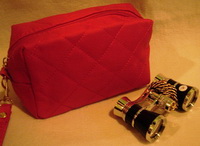 Театральный бинокль 3х25 черный с серебром в красной сумке 14х10х6см